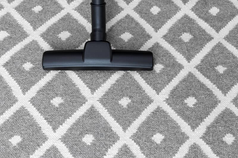 vacuum cleaner in the carpet